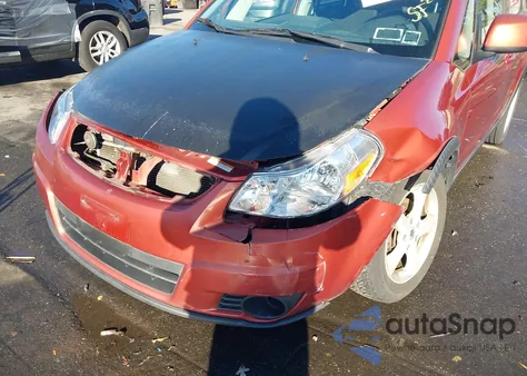 2009 Suzuki Sx4 Technology z USA, uszkodzony, nr VIN JS2YB413895100110